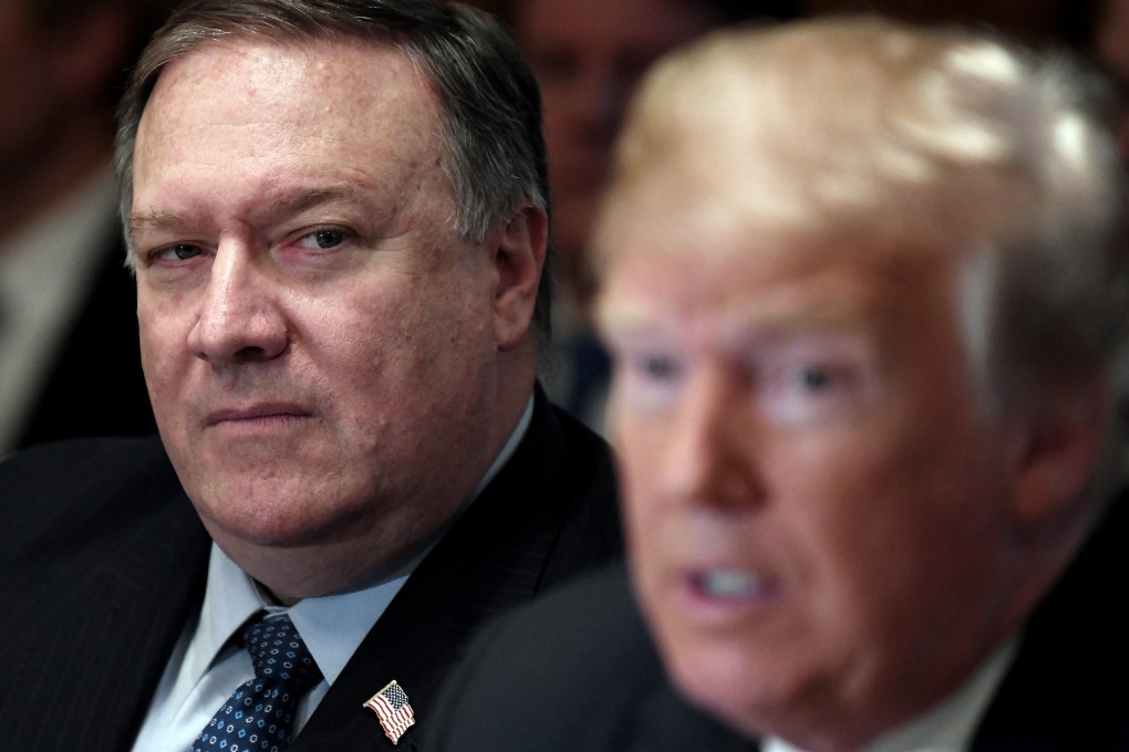 Secretary of State Mike Pompeo listens to President Donald Trump. Photo: TNS