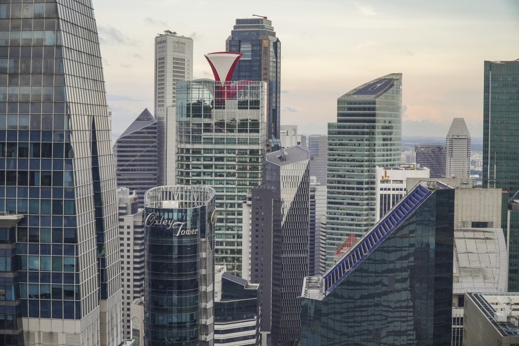 Buildings in Singapore’s central business district. The Ministry of Trade and Industry revised GDP growth upwards and projected the economy will expand by 0.5 to 2.5 per cent next year. Photo: SCMP