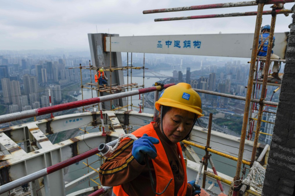 Construction workers in Chongqing, China, on March 22. The fate of China’s economic war with the US depends less on the trade deals negotiated and more on whether China can prevent a property market collapse. Photo: AFP