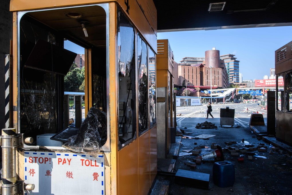 A burnt-out toll booth at the Cross-Harbour Tunnel in Hung Hom. Photo: AFP