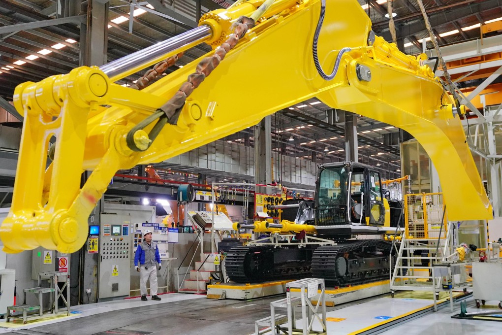 A staff member works at an engineering machinery company in Tangshan, in northern China’s Hebei province. Photo: Xinhua