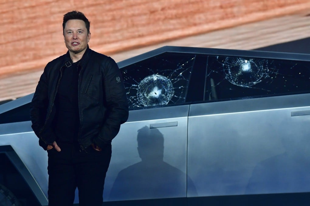 Tesla chief executive Elon Musk stands in front of the shattered windows of the newly unveiled Cybertruck, an electric battery-powered pickup truck, at the Tesla Design Centre in Hawthorne, California on November 21. Photo: Agence France-Presse