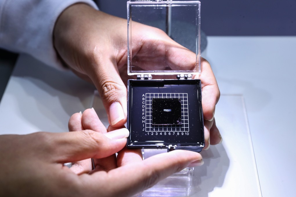 File photo of a photonic AI chip at the 2018 National Mass Innovation and Entrepreneurship Week in Beijing. Photo: Xinhua