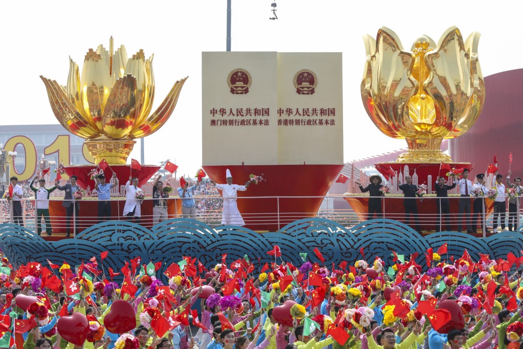 Floats themed on the Hong Kong and Macau handovers, at a parade to celebrate the 70th anniversary of the founding of the People’s Republic of China, in Beijing on October 1. Photo: Simon Song