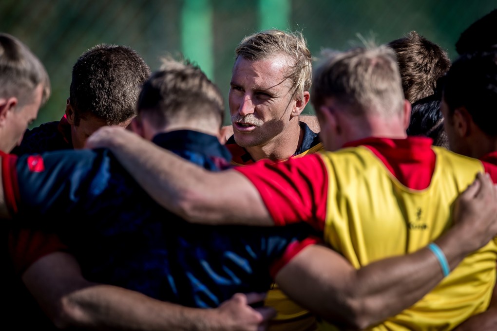 Captain Max Woodward with the rest of his teammates during the captain’s run in Incheon, South Korea. Photo: HKRU