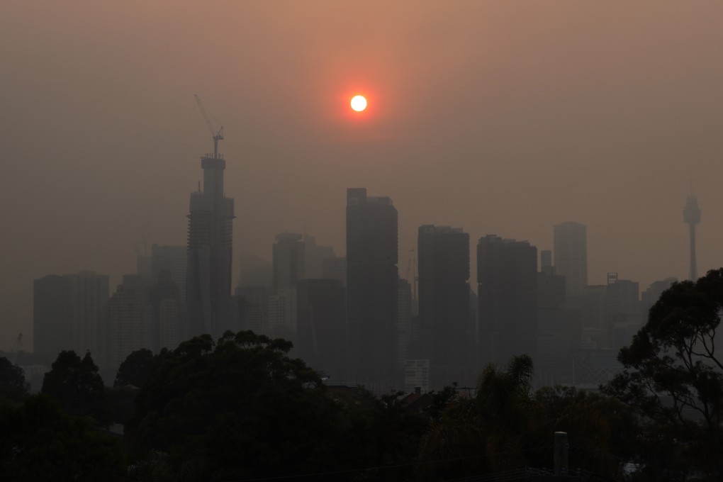The Sydney skyline as winds blow smoke from bush fires over the CBD. Photo: EPA