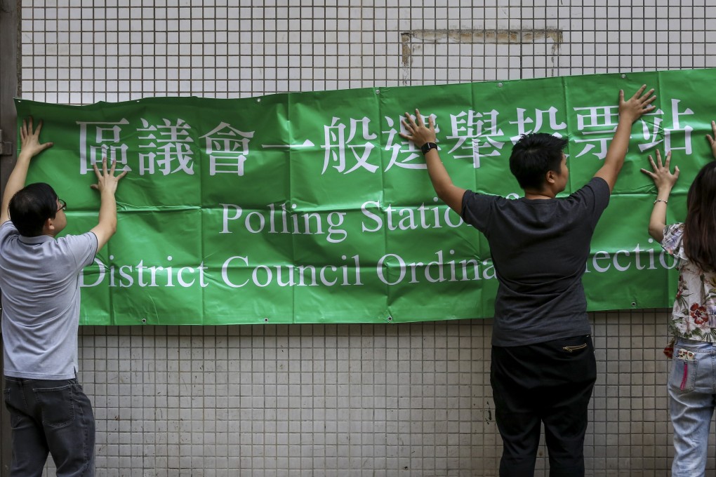 Polling station preparations at Kau Yan School in Sai Ying Pun. Photo: Jonathan Wong.