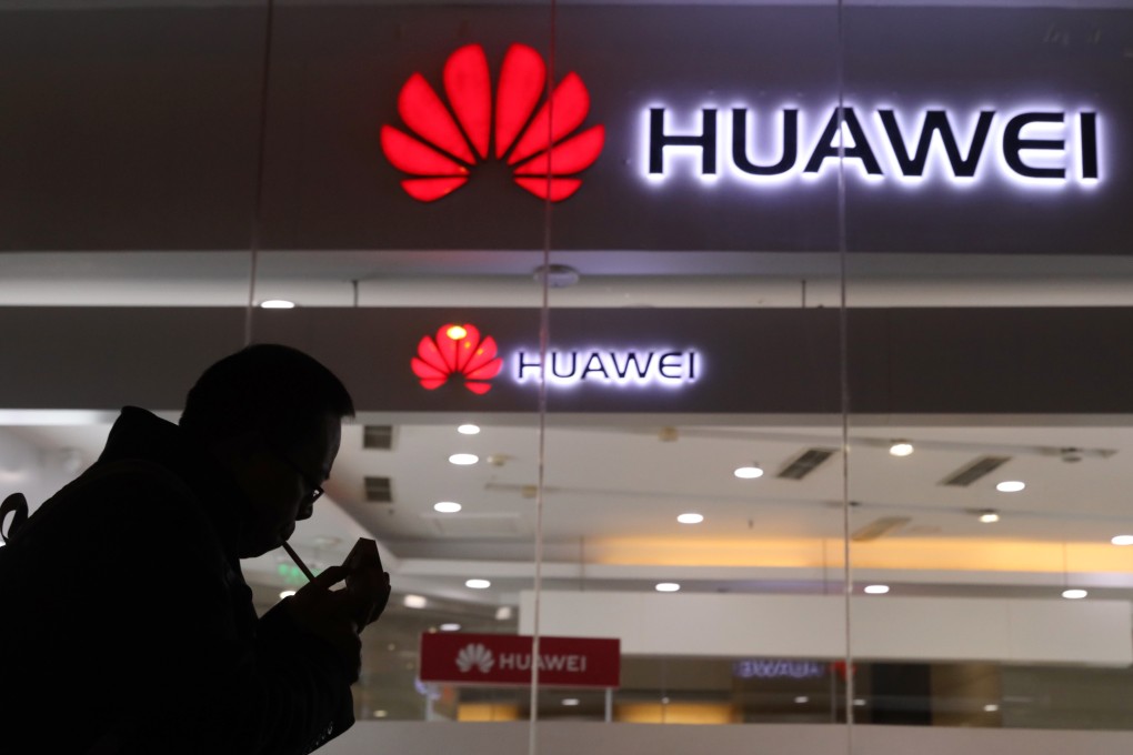 A man outside a Huawei store in Beijing in December 2018. Photo: AP