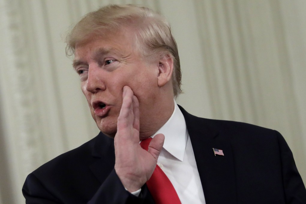 US President Donald Trump says he had a quiet word with his Chinese counterpart about not sending a million troops in to obliterate Hong Kong. In 14 minutes. Photo: EPA