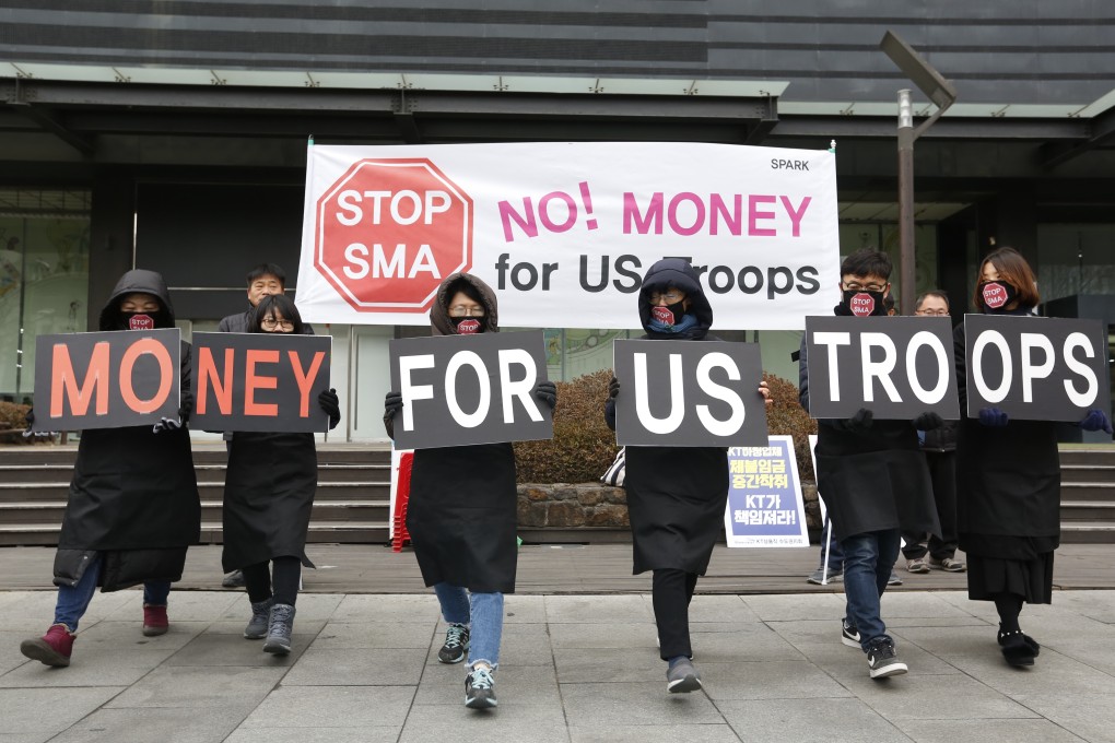 South Korean protesters rally against the government’s financing of US troops. Photo: EPA