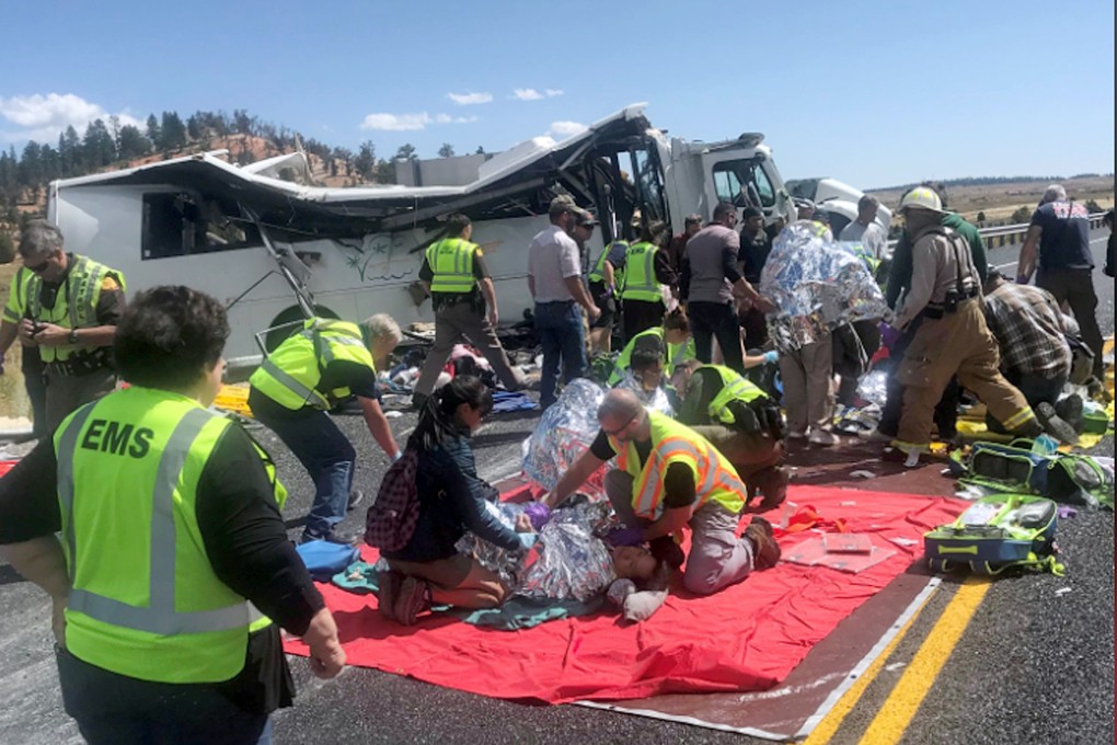 Emergency Medical Services personnel assist victims of a bus crash near Bryce Canyon National Park in southern Utah. Photo: Garfield County Sheriff's Office via AP