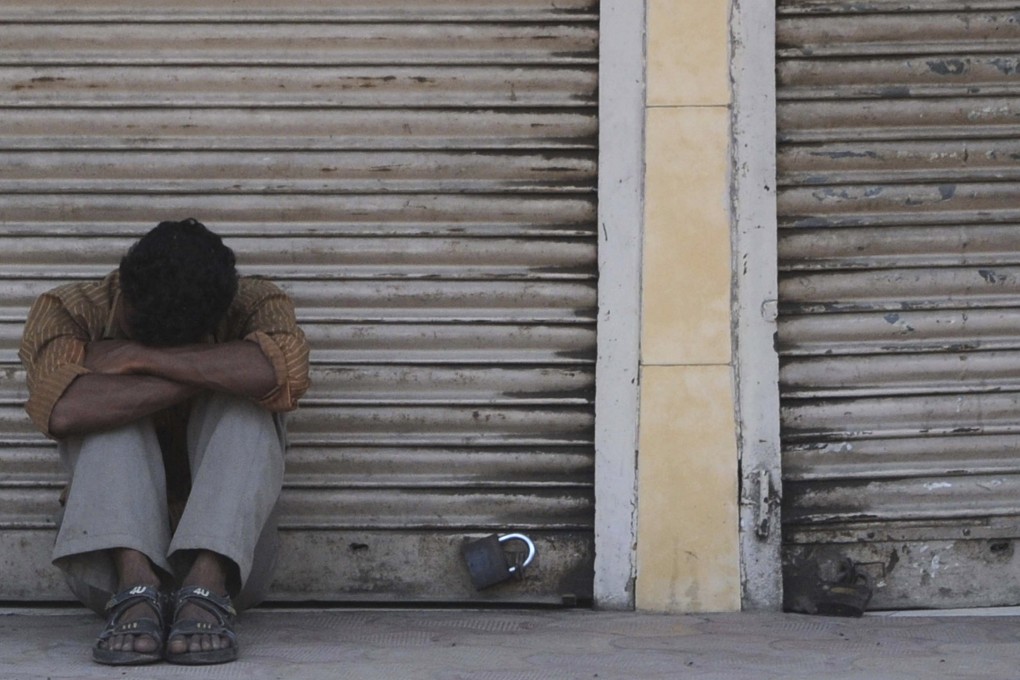 ‘Tax terrorism’ is driving Indians to despair. Photo: AFP