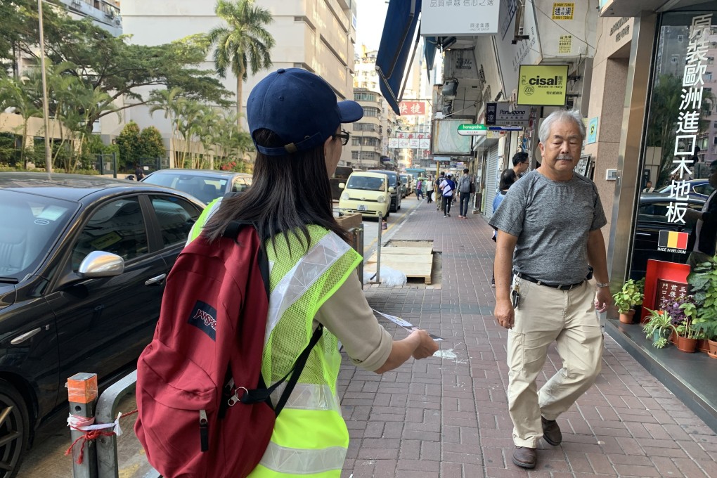 Chan hands out leaflets for Lucifer Siu of Mong Kok North. Photo: Kinling Lo