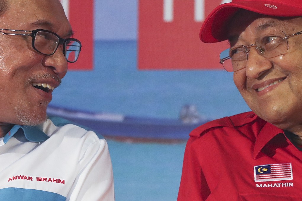 Malaysia’s prime minister-in-waiting Anwar Ibrahim and Prime Minister Mahathir Mohamad. Photo: EPA