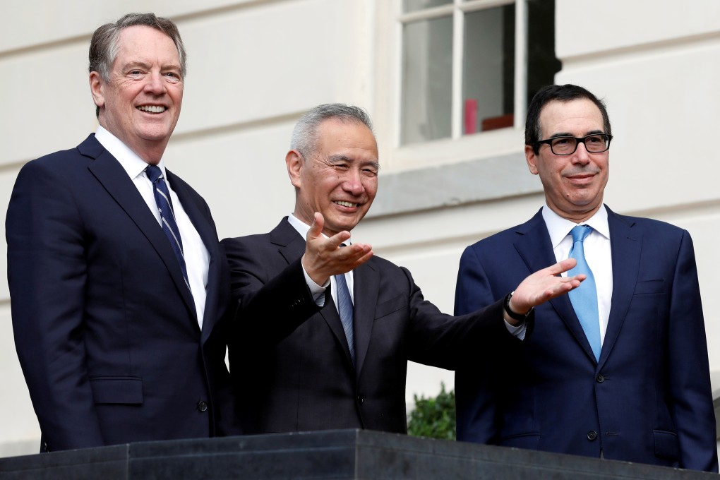 The US’ Robert Lighthizer (left) and Steve Mnuchin, and China’s Liu He (centre), pictured during talks last month, spoke by telephone on Tuesday. Photo: Reuters