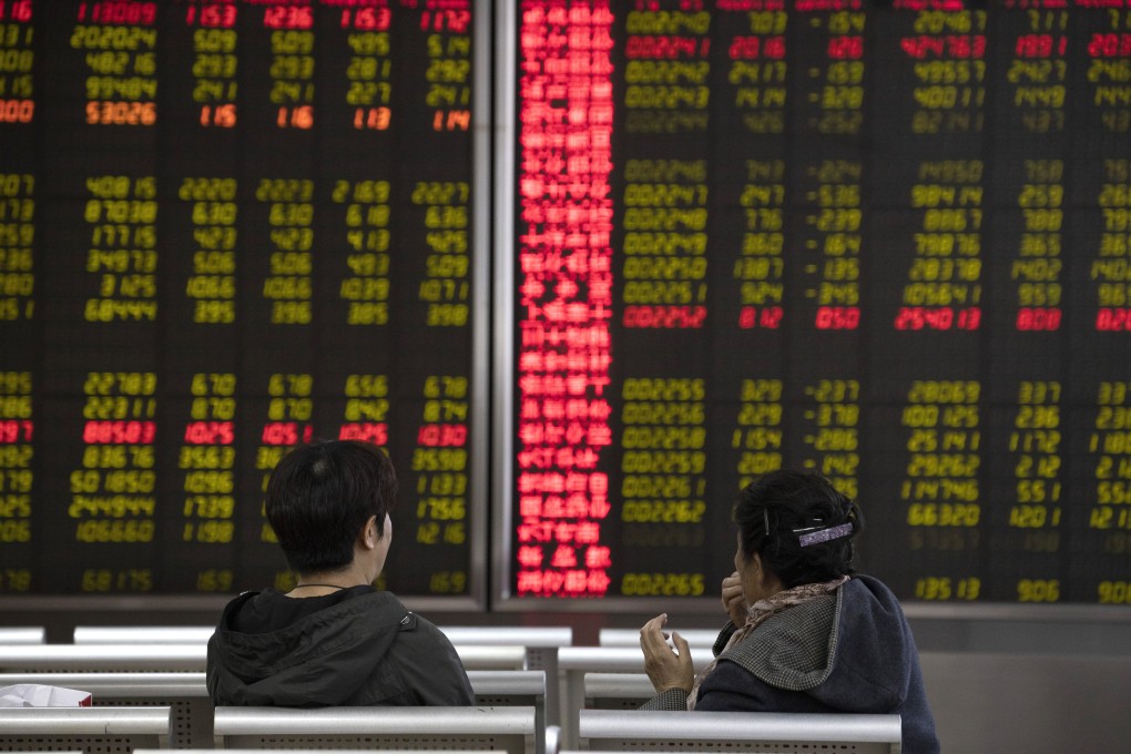 Investors monitor stocks in Beijing on November 11, 2019. Photo: Associated Press