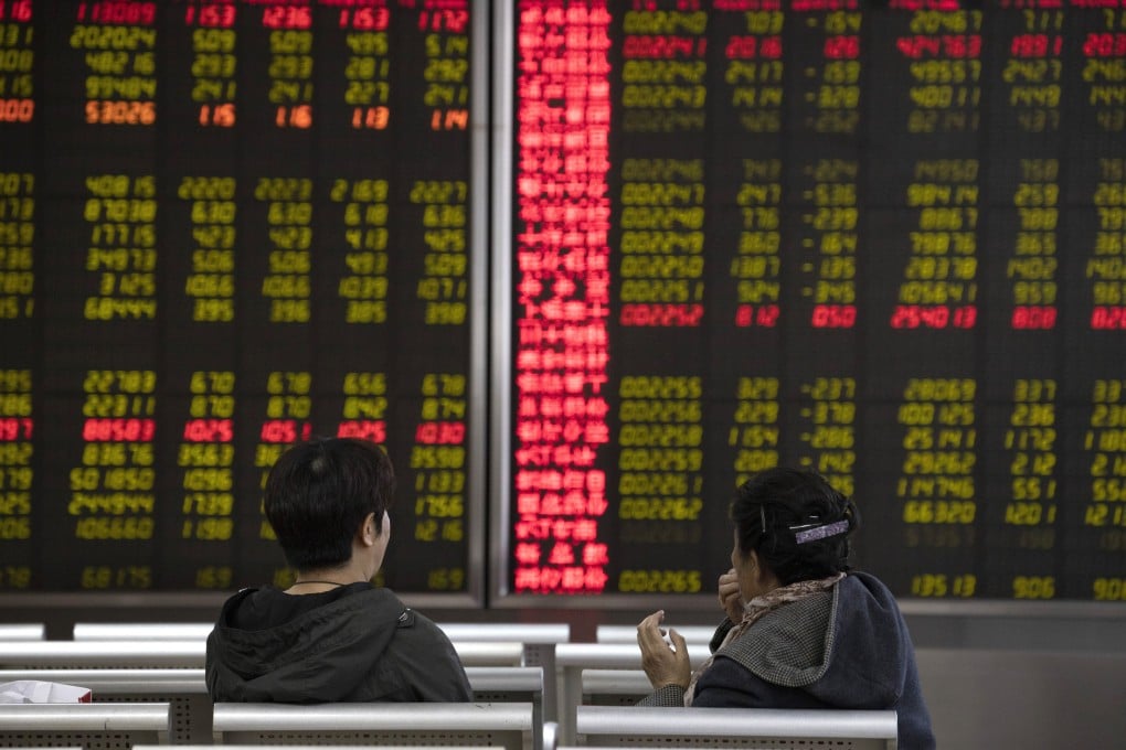 Investors monitor stocks in Beijing on November 11, 2019. Photo: Associated Press