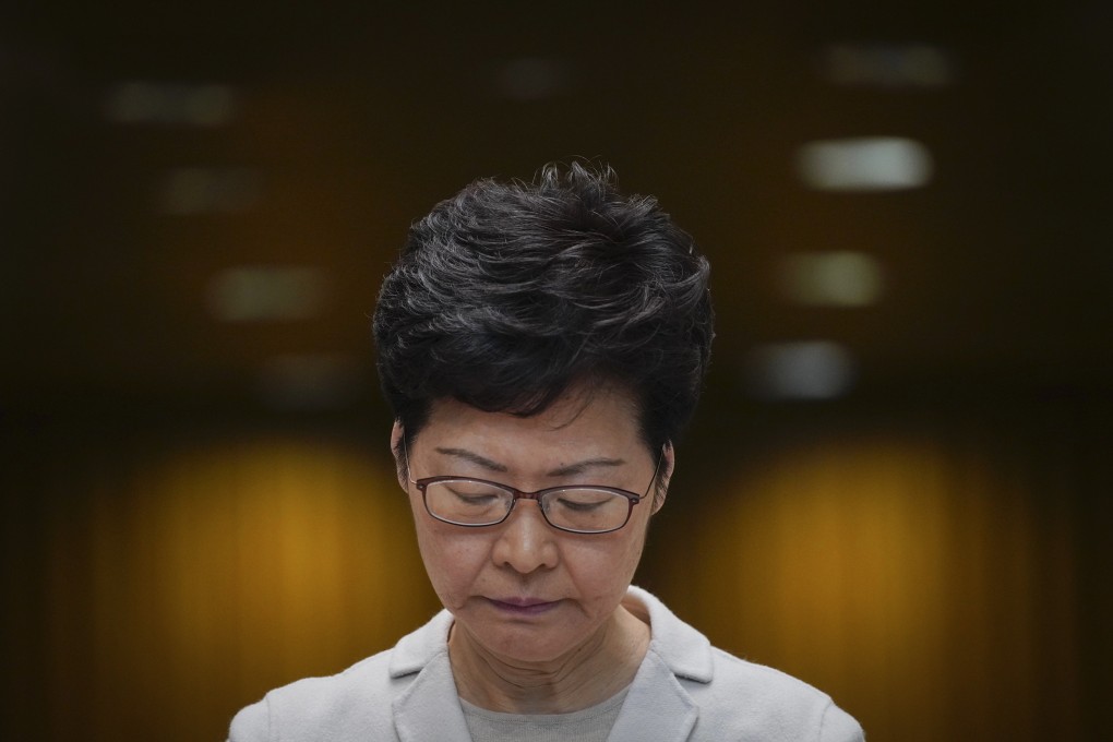 Hong Kong Chief Executive Carrie Lam addresses a press conference on November 26, a day after the district council election results dealt a crushing defeat to parties supportive of her government. Photo: AP