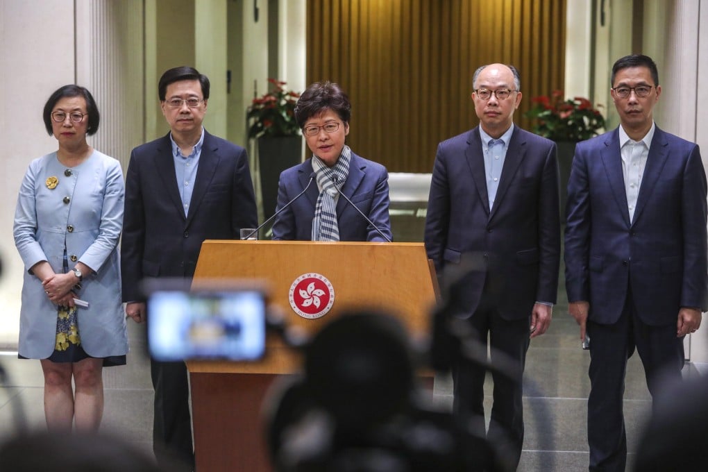Carrie Lam (centre), with top government officials, has been sent a clear message by voters. Photo: May Tse