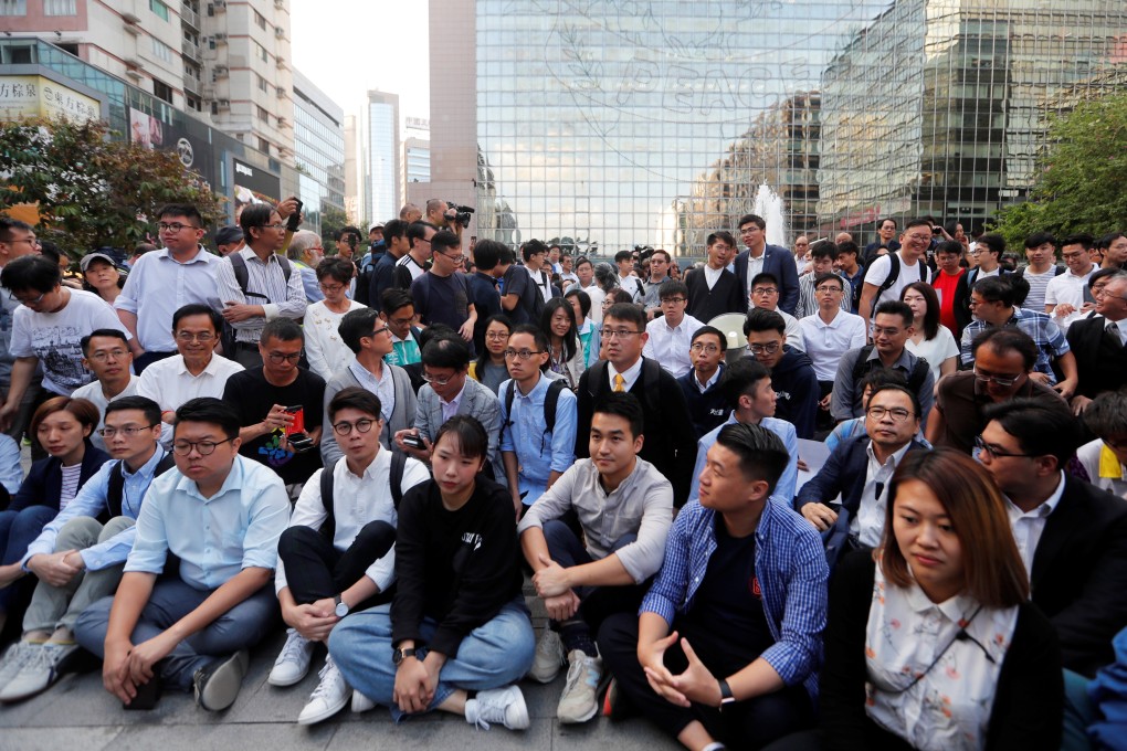 Pan-democratic winners gather outside Hong Kong Polytechnic University (PolyU) in Hung Hom on November 25. Photo: Reuters