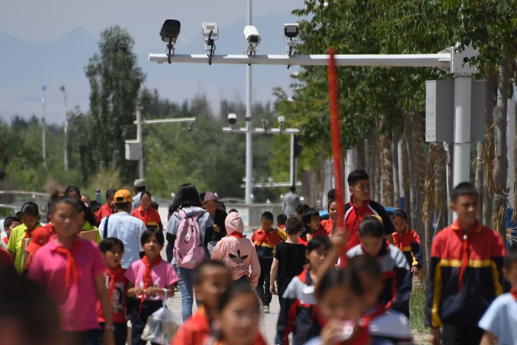 Surveillance cameras monitor school children in Akto county in Xinjiang. Photo: AFP