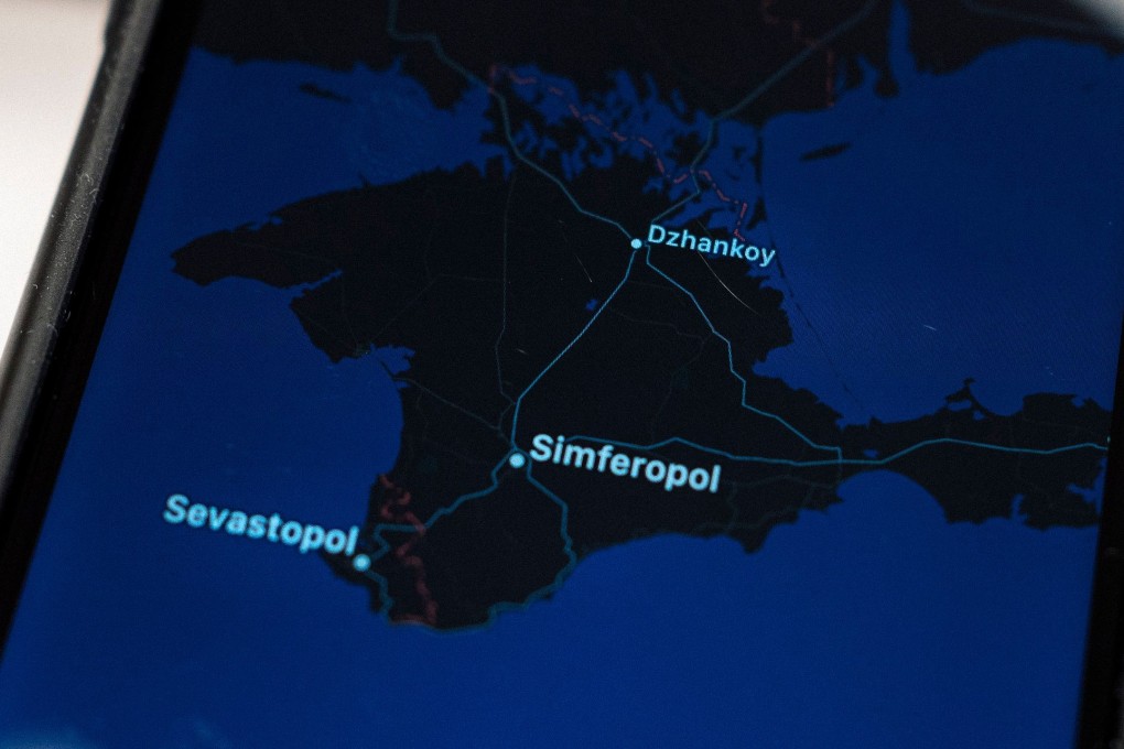An Apple map with the Crimean peninsula on a smartphone screen. Photo: AFP