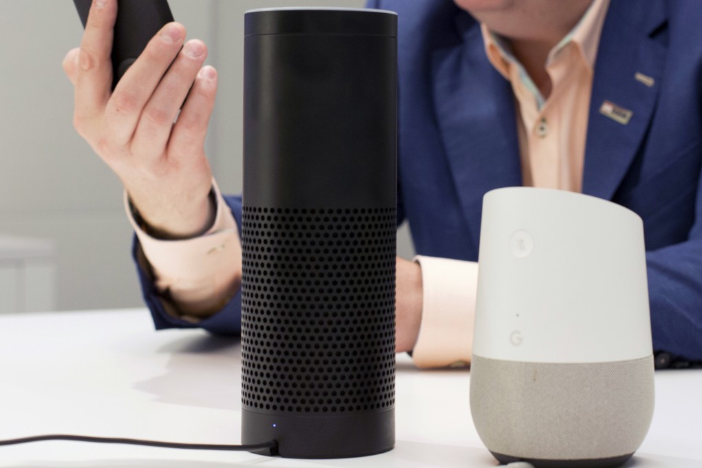 Amazon Echo (left) and Google Home smart speakers on display in New York. Which one is best? Photo: AP