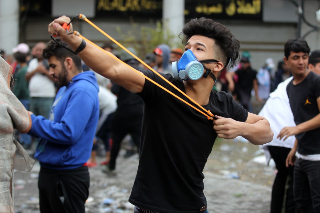 Iraqi protesters clash with Iraqi security forces. Photo: AFP