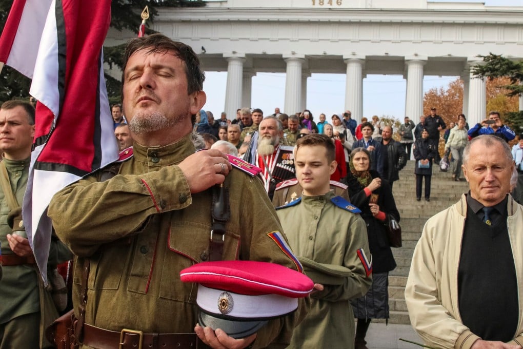 Cossacks in Sevastopol, Crimea attend a procession dedicated to the anniversary of anti-Bolshevik’s army evacuation from Crimea in 1920. Photo: Reuters