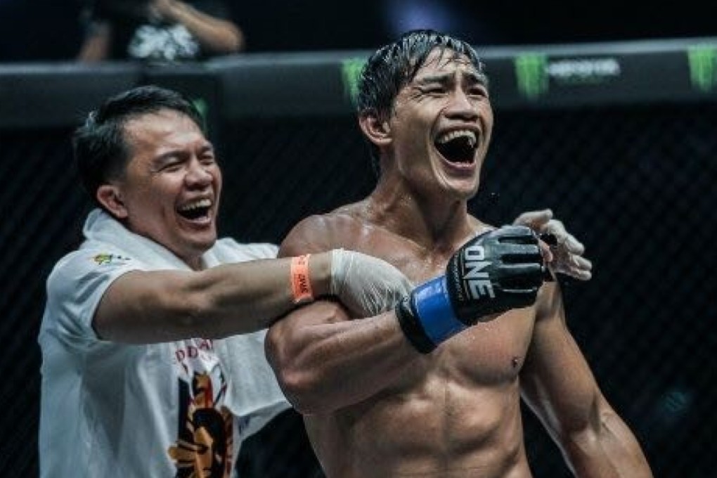 Team Lakay coach Mark Sangiao celebrates with Eduard Folayang. Photos: One Championship