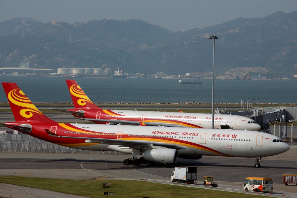 Hong Kong Airlines has stopped flying a quarter of its 39 planes and made cutbacks on flying, affecting almost a dozen destinations, to tide itself over its financial crisis. Photo: Reuters
