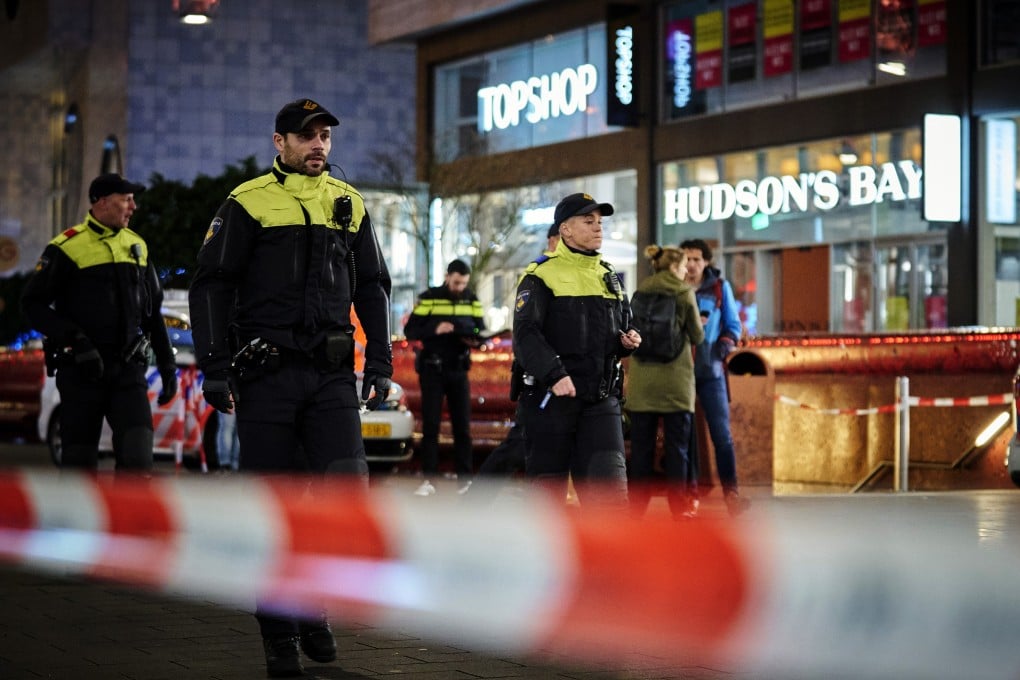 Dutch police secure a shopping street after a stabbing incident in The Hague on Friday. Photo: AP