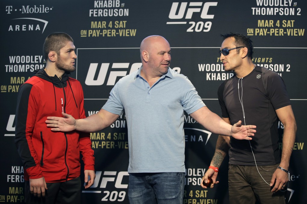 UFC president Dana White stands between Tony Ferguson (right) and Khabib Nurmagomedov in March 2017. Photo: AP