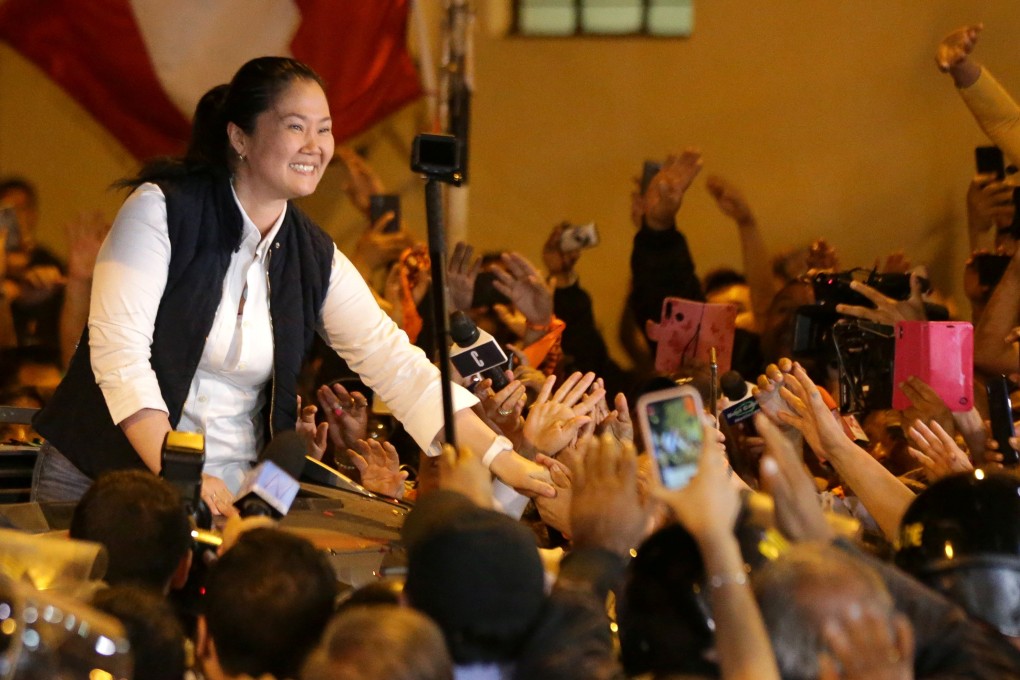 Keiko Fujimori greets supporters after being released from the Santa Monica prison in Lima on November 29, 2019. Photo: Reuters
