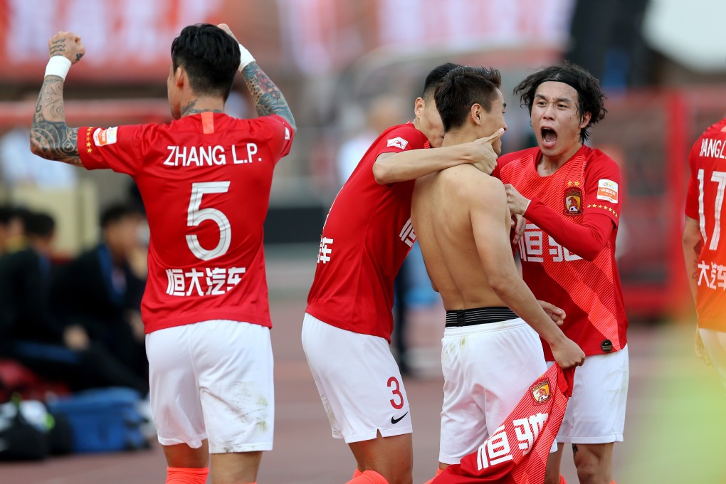 Guangzhou Evergrande players celebrate another league championship. Photo: Xinhua