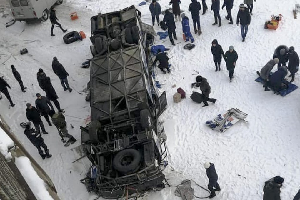 The bus after plunging from a bridge over the Kuenga River, about 4,900 kilometres east of Moscow. Photo: AP