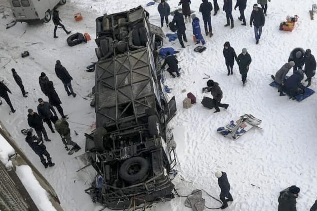 The bus after plunging from a bridge over the Kuenga River, about 4,900 kilometres east of Moscow. Photo: AP