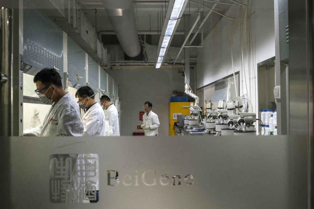 Researchers work inside a laboratory at BeiGene’s research and development centre in Beijing. Photo: Bloomberg