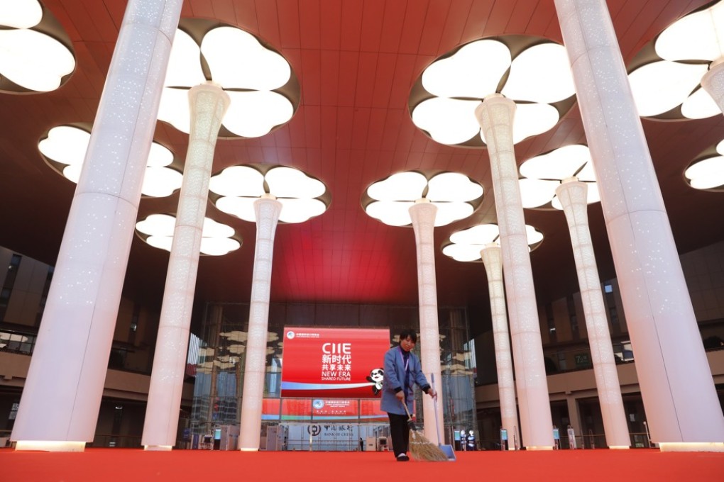 epa07971479 A cleaner works outside the exhibition venue one day ahead of the opening of the 2nd China International Import Expo at the National Exhibition and Convention Center in Shanghai, China, 04 November 2019. The Expo will be held in Shanghai from 05 to 10 November 2019. EPA-EFE/WU HONG
