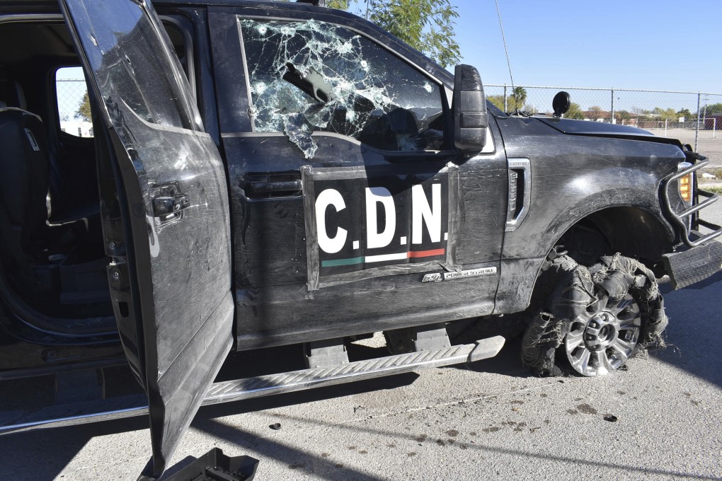 Bullet-riddled trucks left abandoned in the streets were marked C.D.N. – Spanish initials of the Cartel of the Northeast gang. Photo: AP