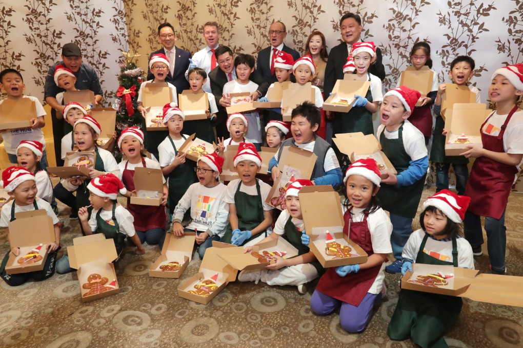 About 30 children make gingerbread men at Hong Kong Gold Coast Hotel, part of Operation Santa Claus. Photo; Edmond So