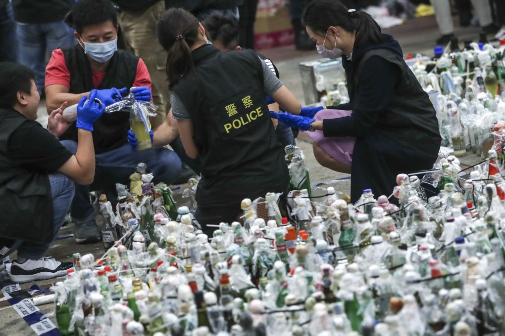 A total of 3,989 petrol bombs, 1,339 pieces of explosives and 601 bottles of corrosive liquid were found at PolyU. Photo: Sam Tsang