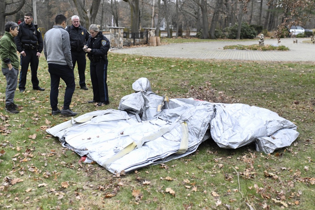 The uninflated slide fell from a flight from Paris to Boston. Photo: AP