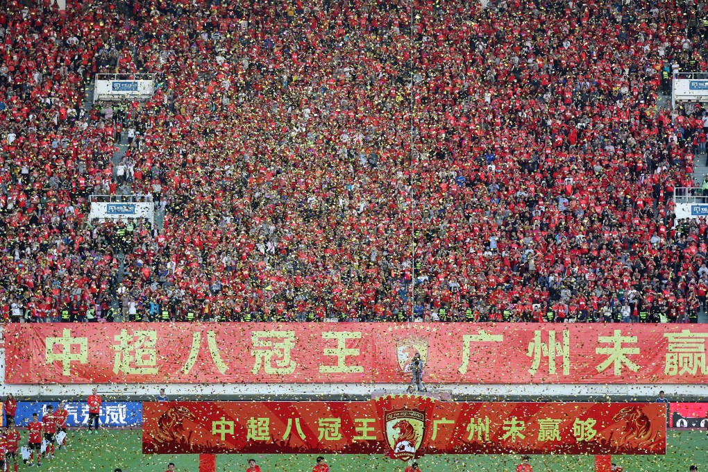 Guangzhou rewrote their names in the CSL history books with an eighth league championship. Photos: Xinhua