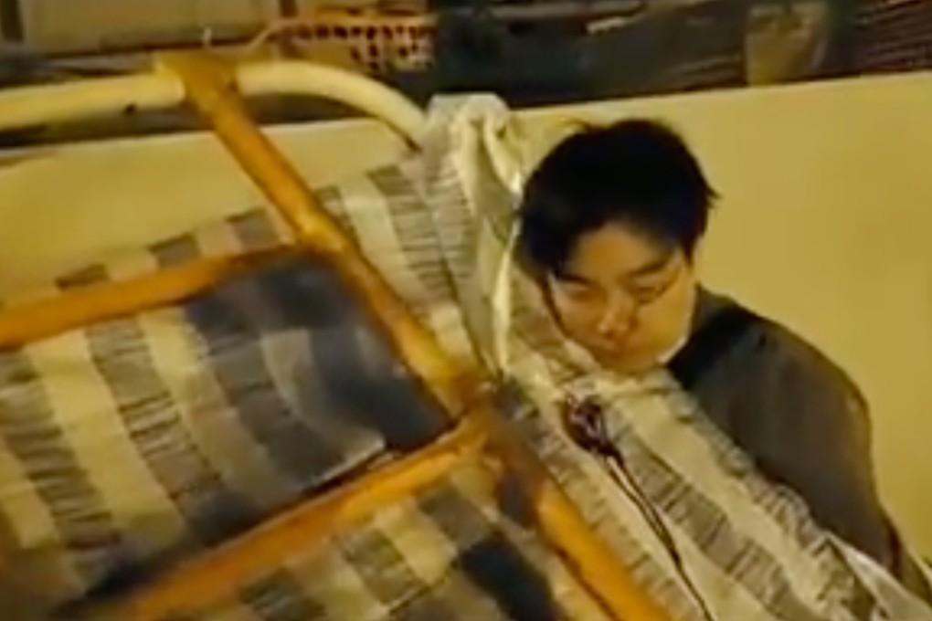 A masked man attacked his victim, who was clearing protesters’ barricades in Mong Kok on Sunday, with what the police chief said was a drain cover. Photo: Handout