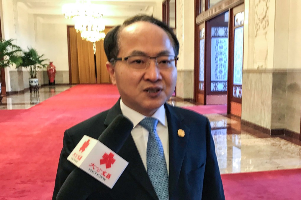 Wang Zhimin was keen to sound upbeat when he faced the media. Picture: Jun Mai