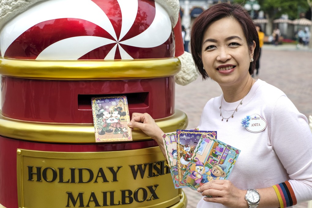 Anita Lai, vice-president of communications and public affairs, Hong Kong Disneyland, with holiday postcards at Disneyland, Lantau Island. Photo: Tory Ho
