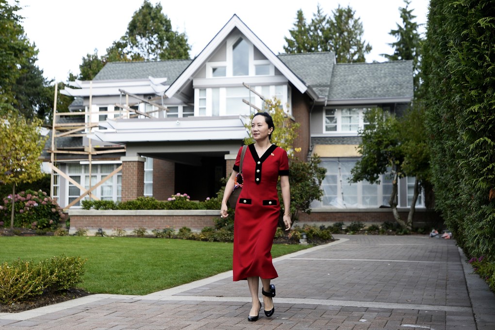 Meng Wanzhou, chief financial officer of Huawei, leaves her home in Vancouver, Canada, for a court appearance in October while wearing an electronic ankle tag. Photo: Bloomberg