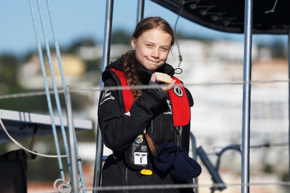 Greta Thunberg arrives aboard the yacht La Vagabonde at Santo Amaro port in Lisbon, Portugal, on her way to the UN Climate Change Conference. Photo: Reuters
