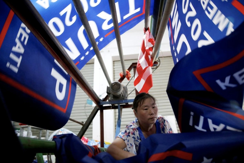 A worker makes flags for US President Donald Trump’s “Keep America great!” 2020 re-election campaign at a company in Fuyang, Anhui province, China, on July 24, 2018. Trump’s trade war has hit China’s export-driven manufacturers hard. Photo: Reuters
